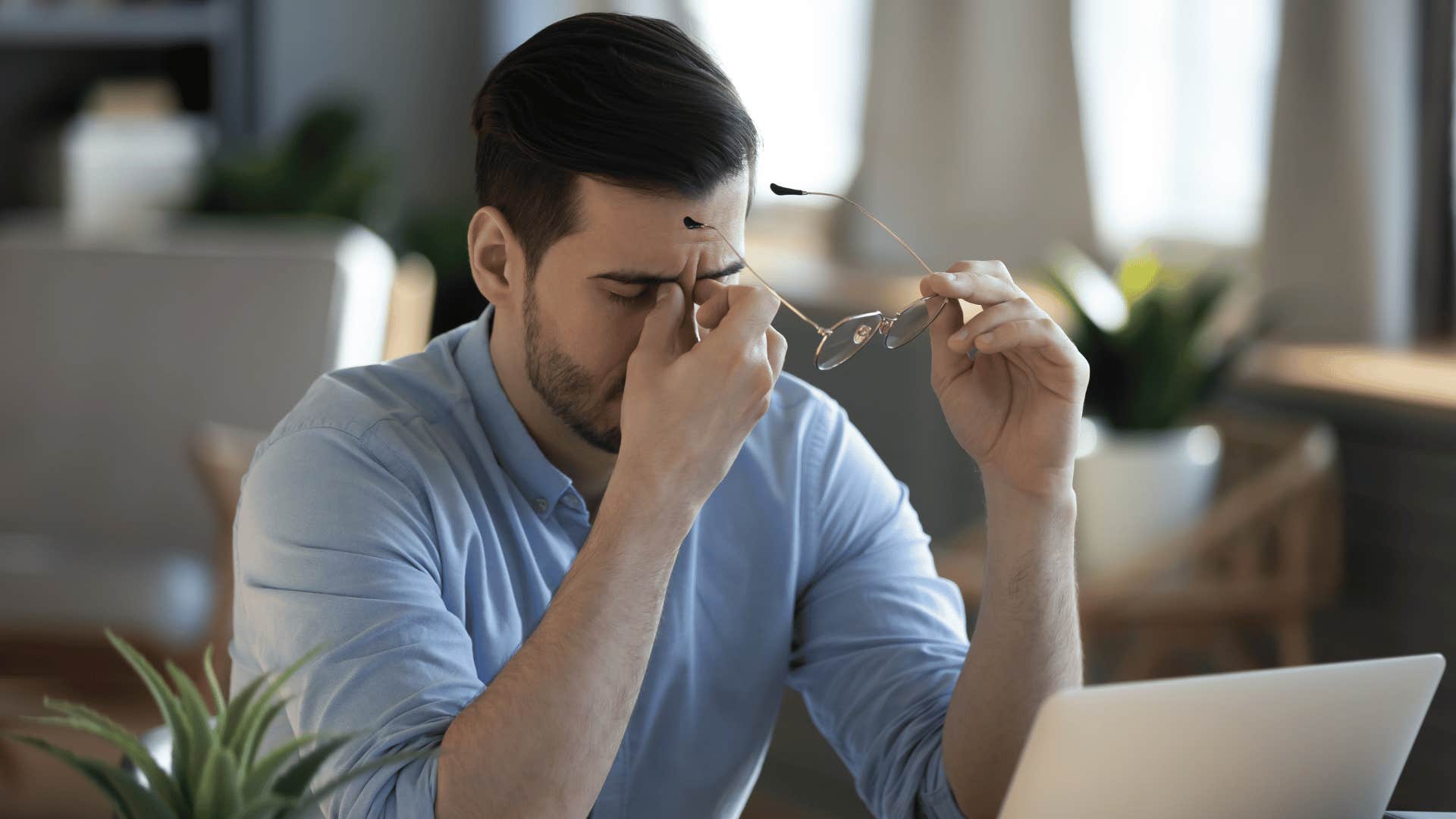 man frustrated while working 