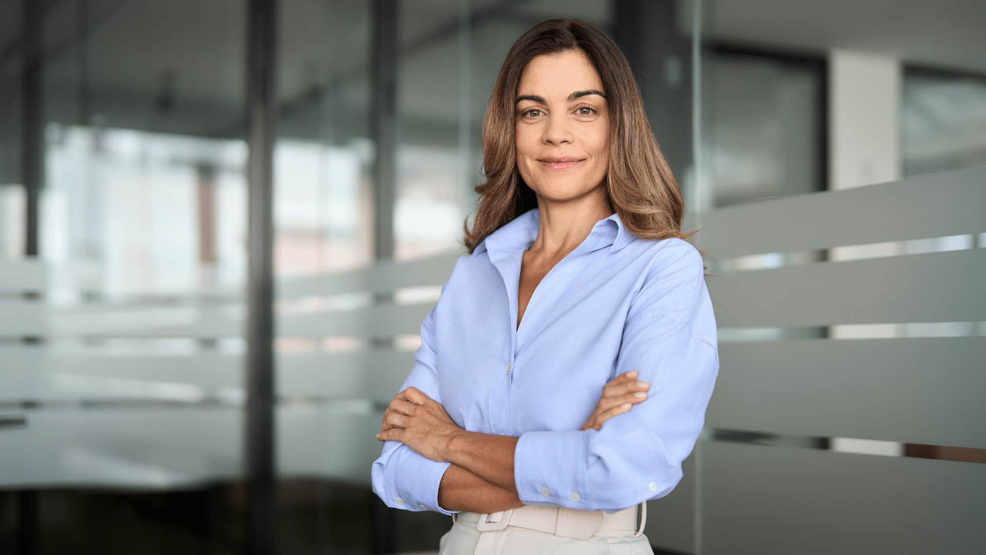 confident woman crossing arms 