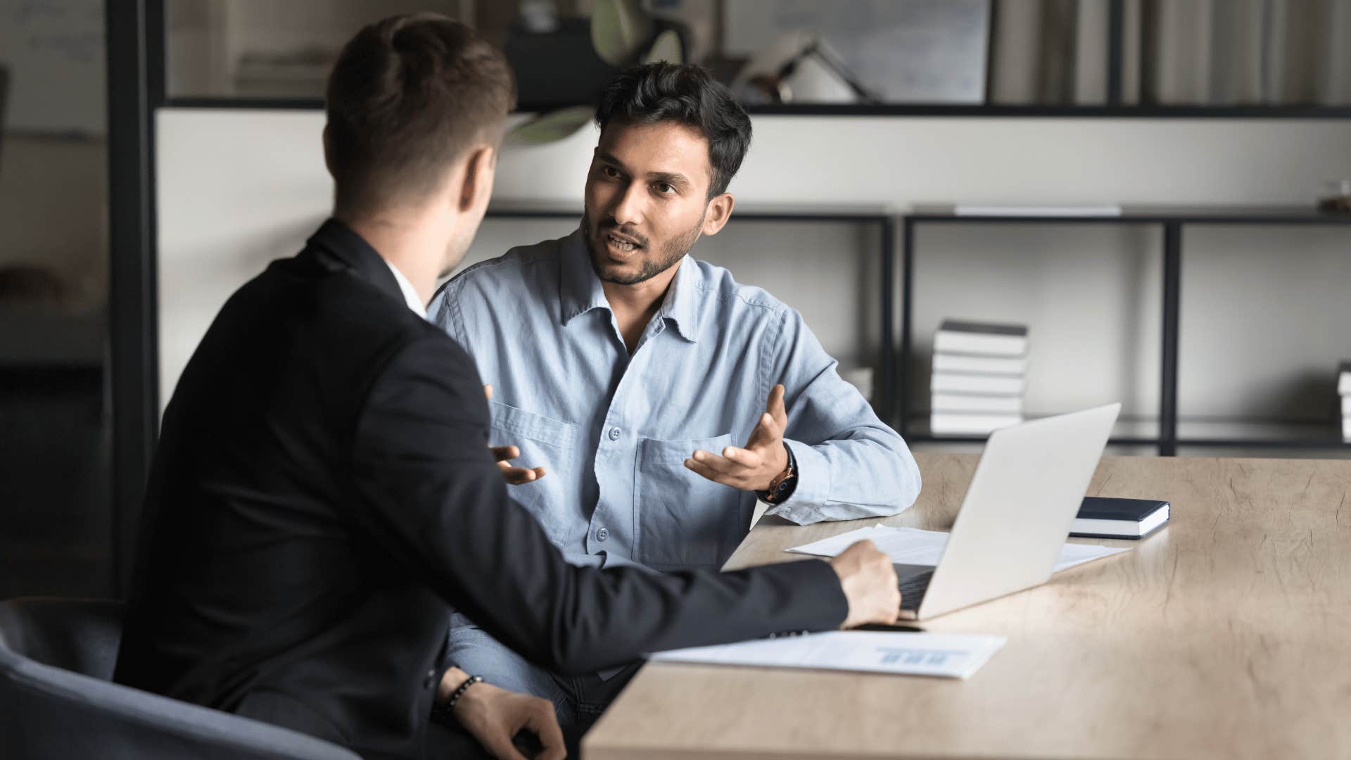 two men talking 