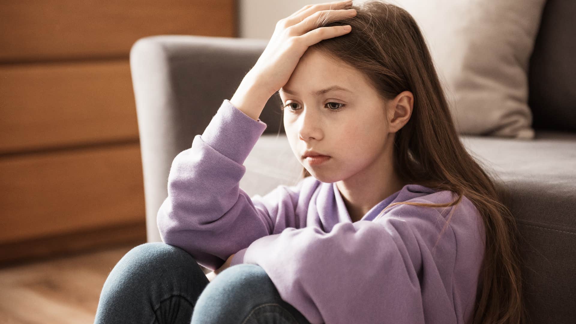 Young woman looking upset and stressed.