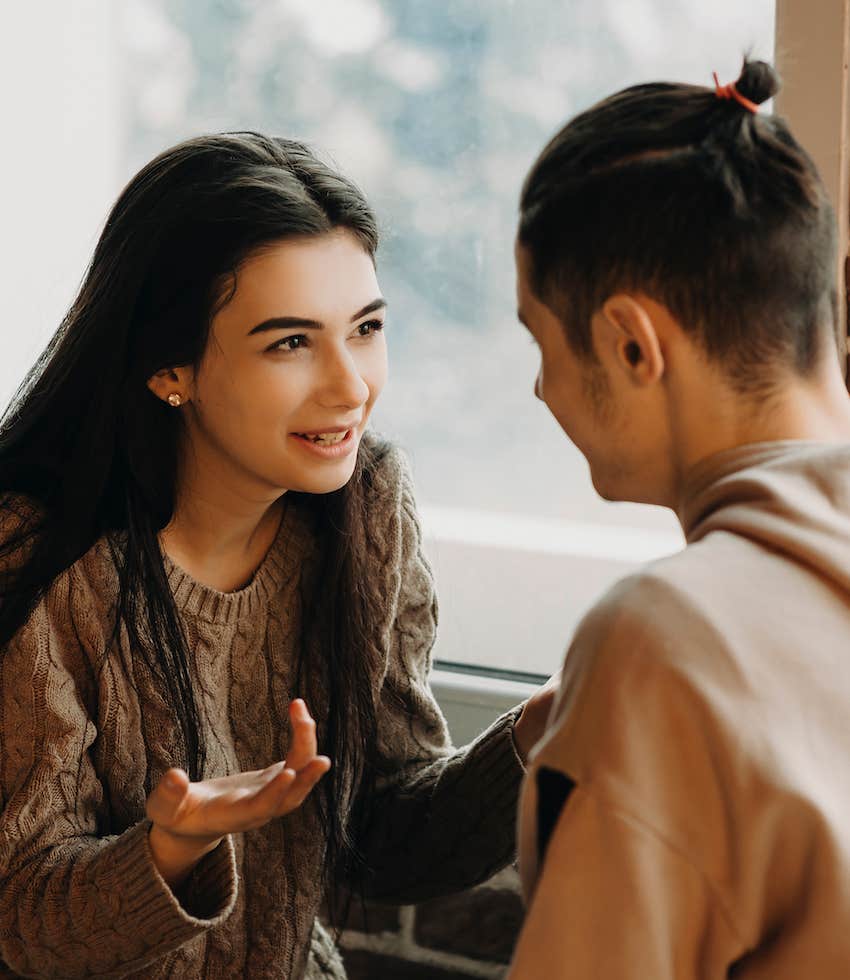 She talks seriously, he listens actively