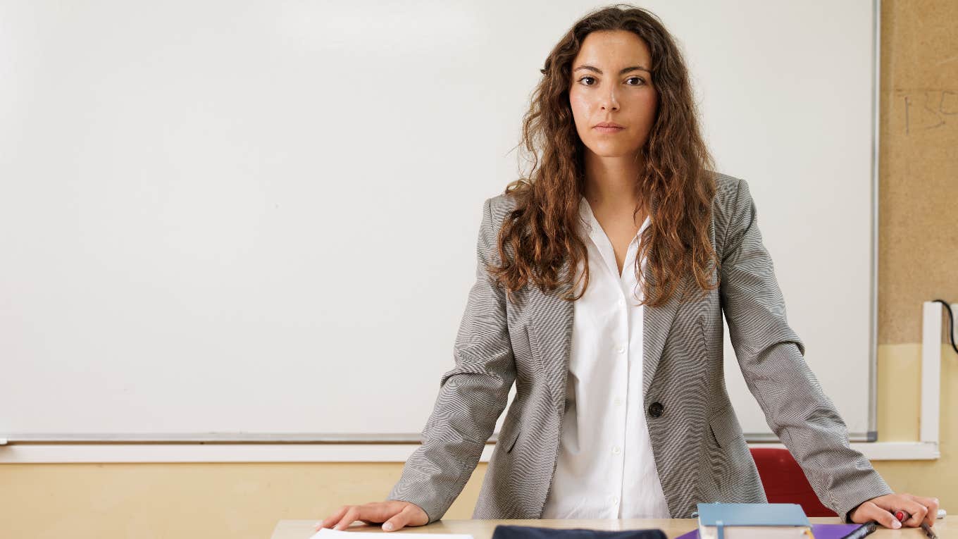 Teacher in classroom without decorations