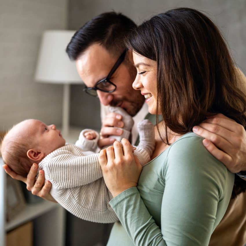 Attentive new mom and dad