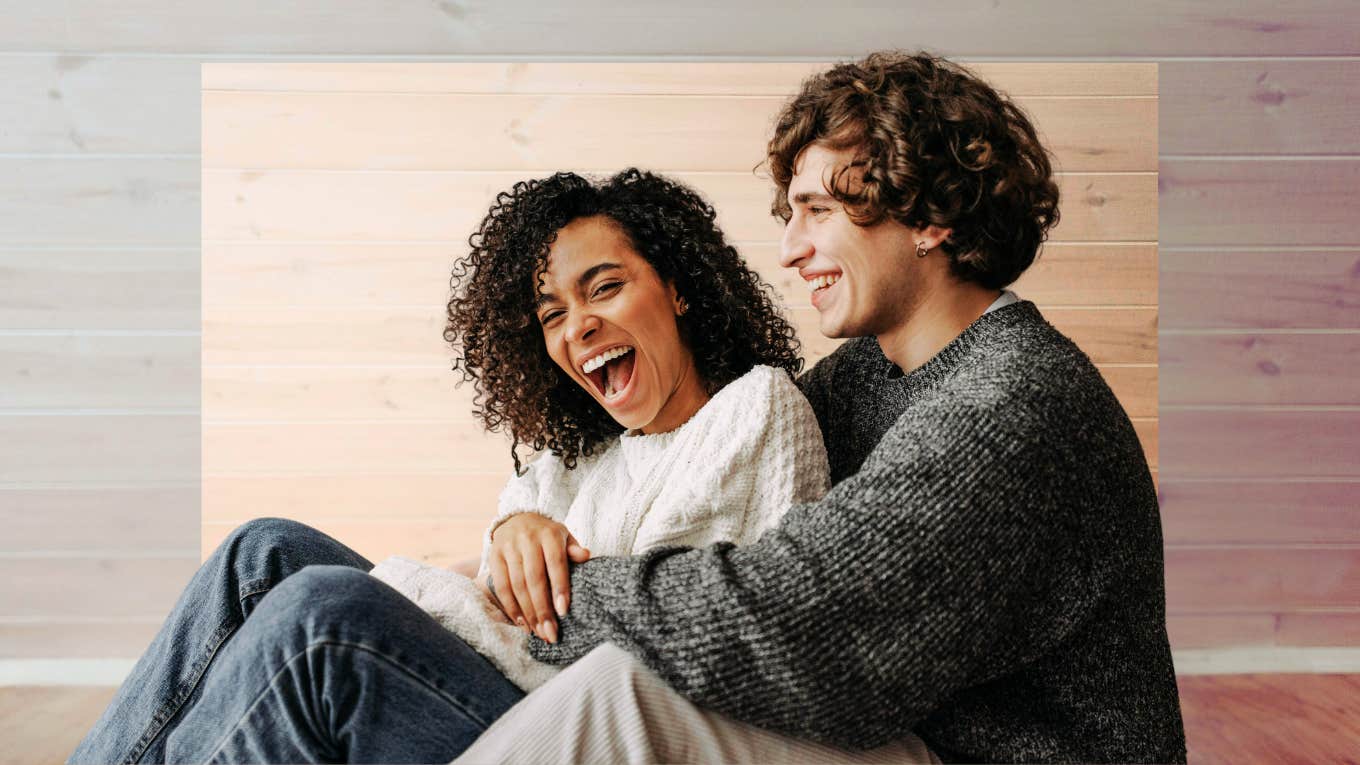 Couple in love, man wrapping his arms around woman.