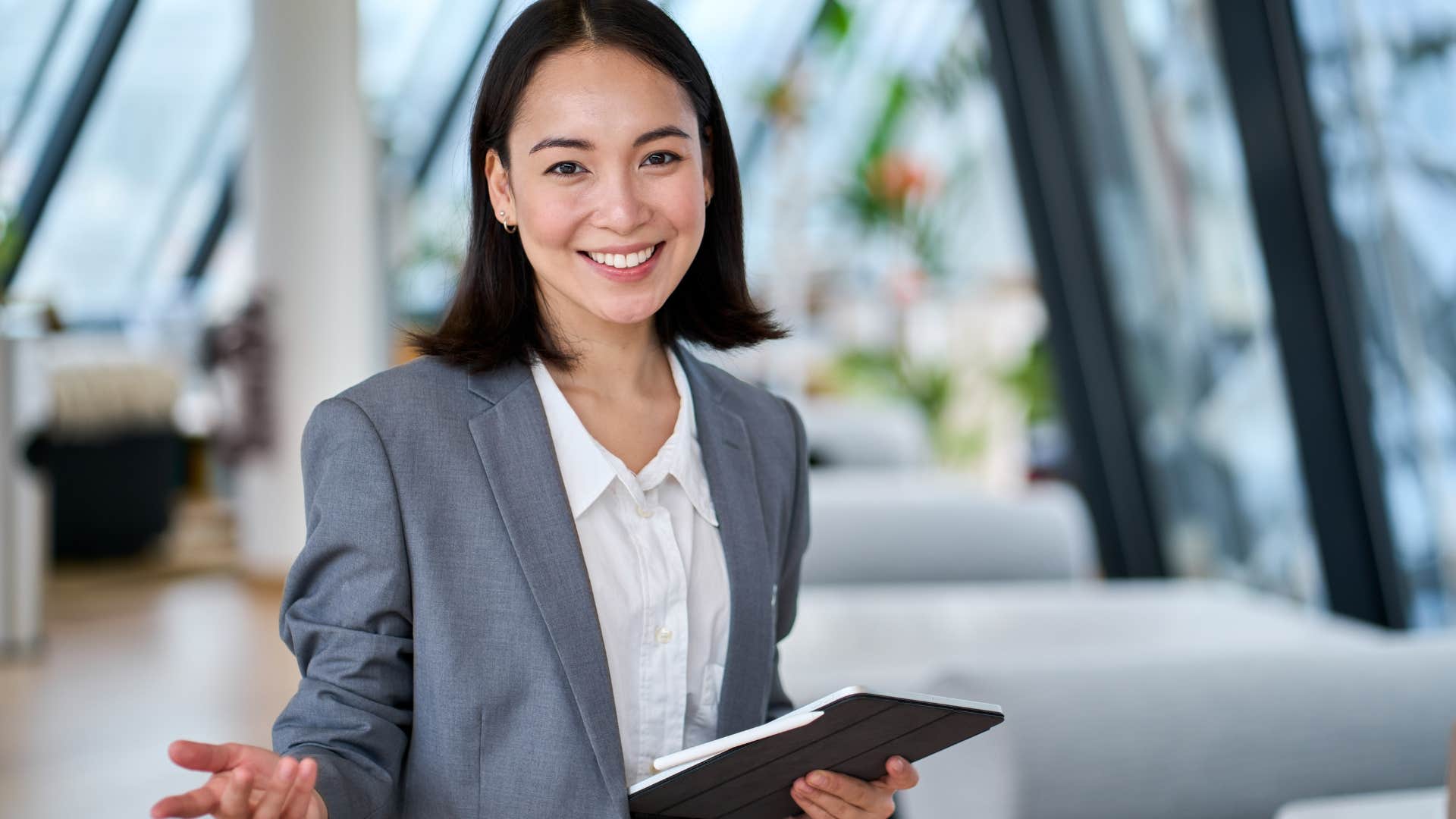 Professional woman smiling in her office.