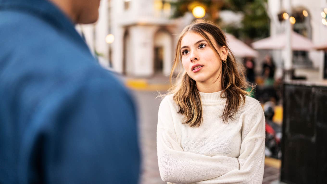 Annoyed woman running into ex wanting to come back.