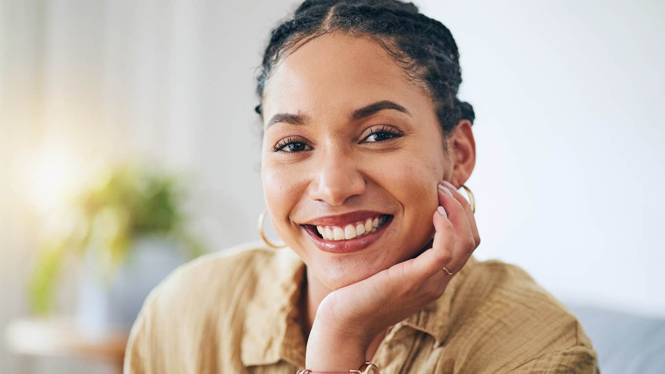 smiling happy woman wearing a watch