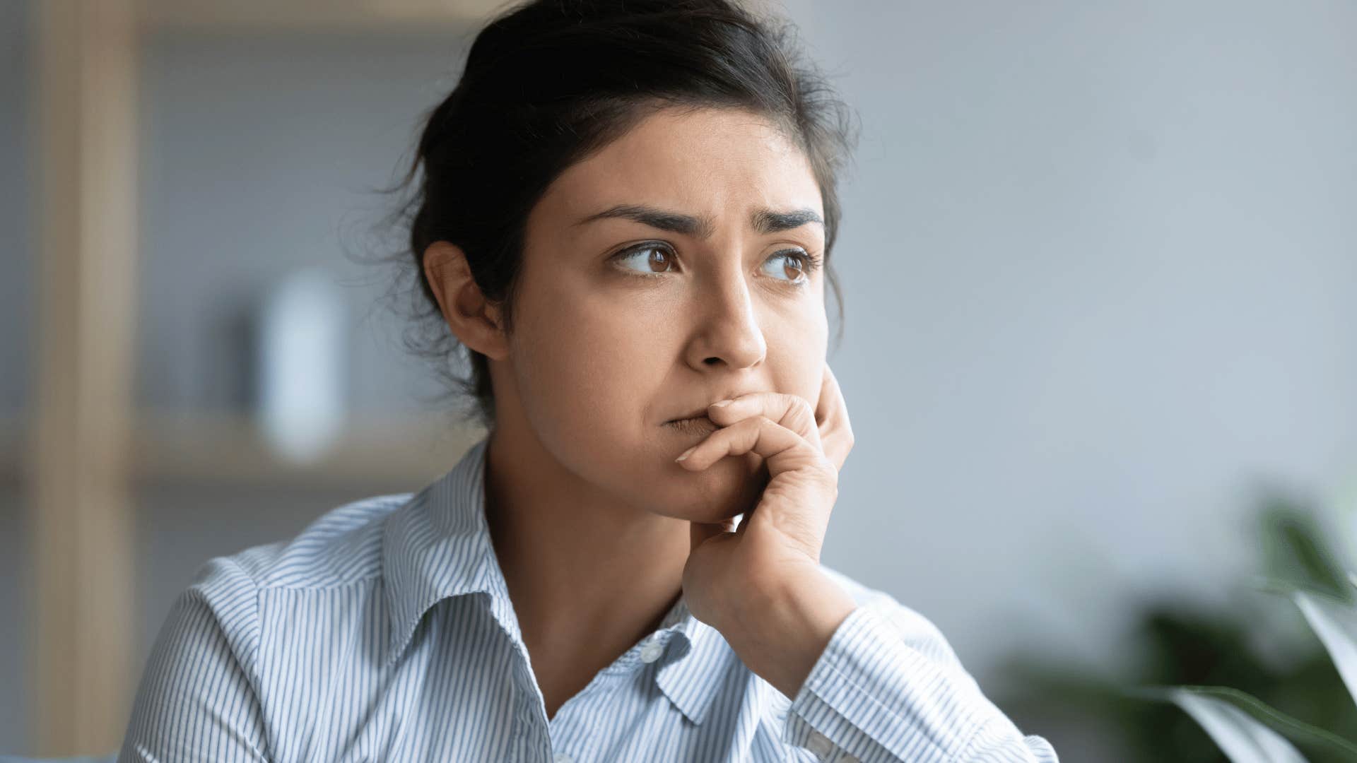 woman thinking about mom shame