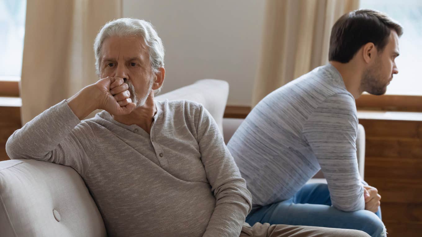 upset father sitting next to struggling adult son