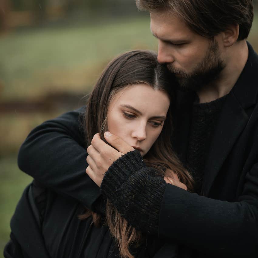 man and woman in Autumn gloomy mood.