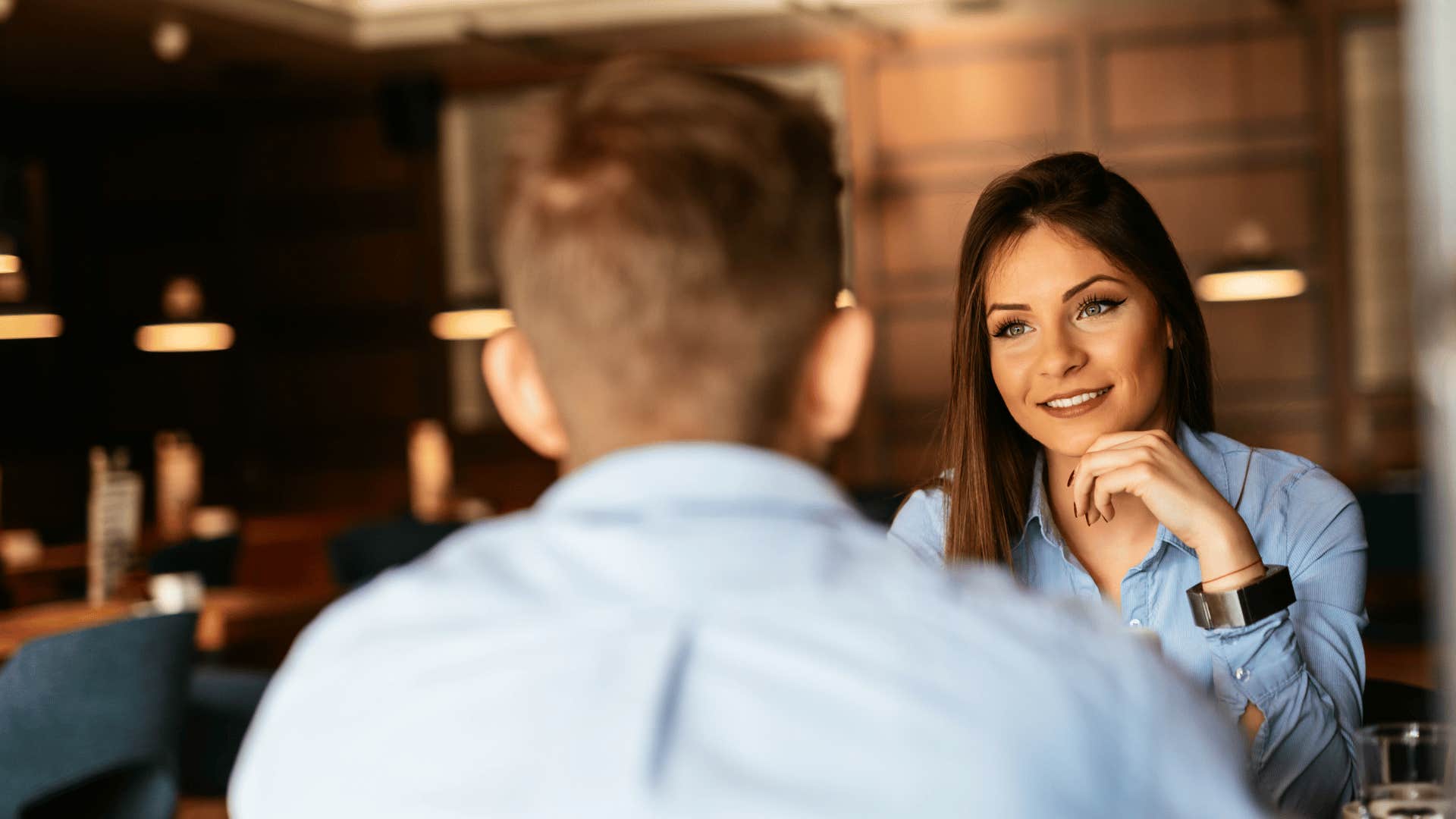 man and woman talking 