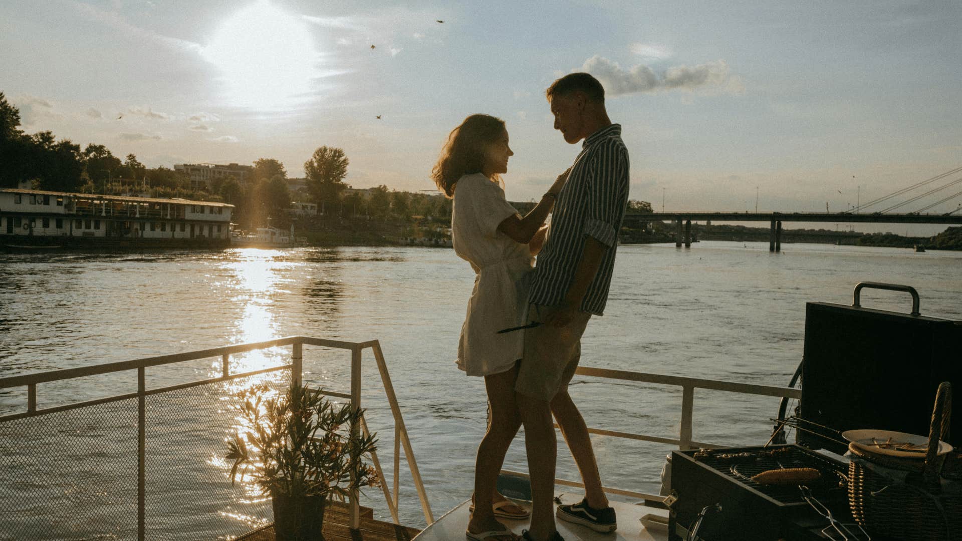 couple dancing by the water