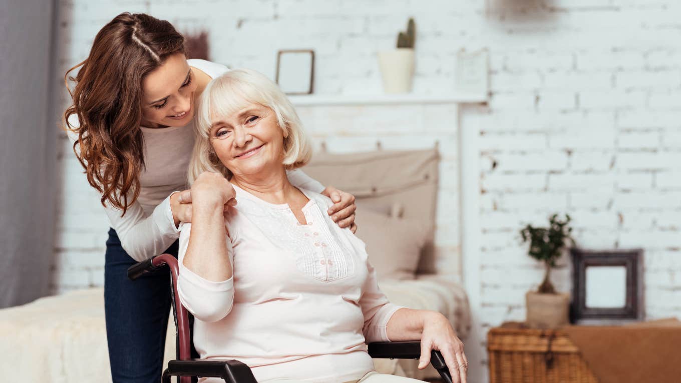 Woman caring for her elderly boomer mom