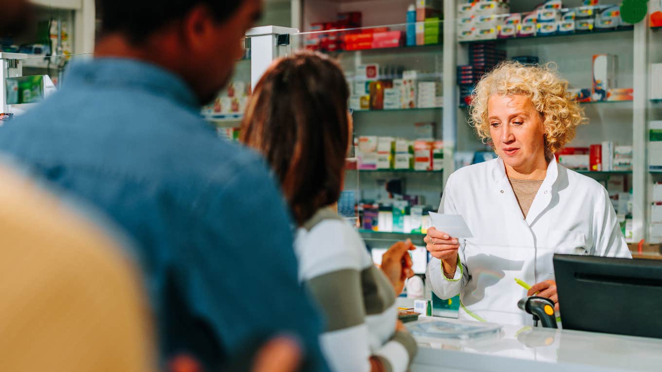 People lined up at pharmacy, stimulant epidemic.