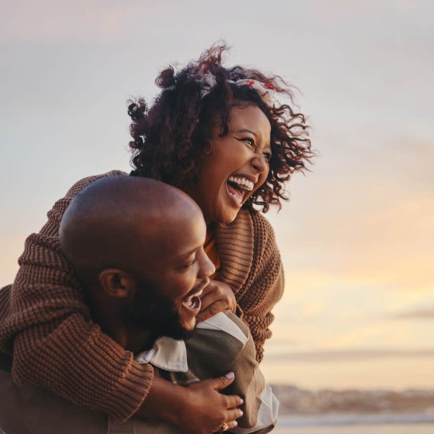 couple, travel and beach fun while laughing