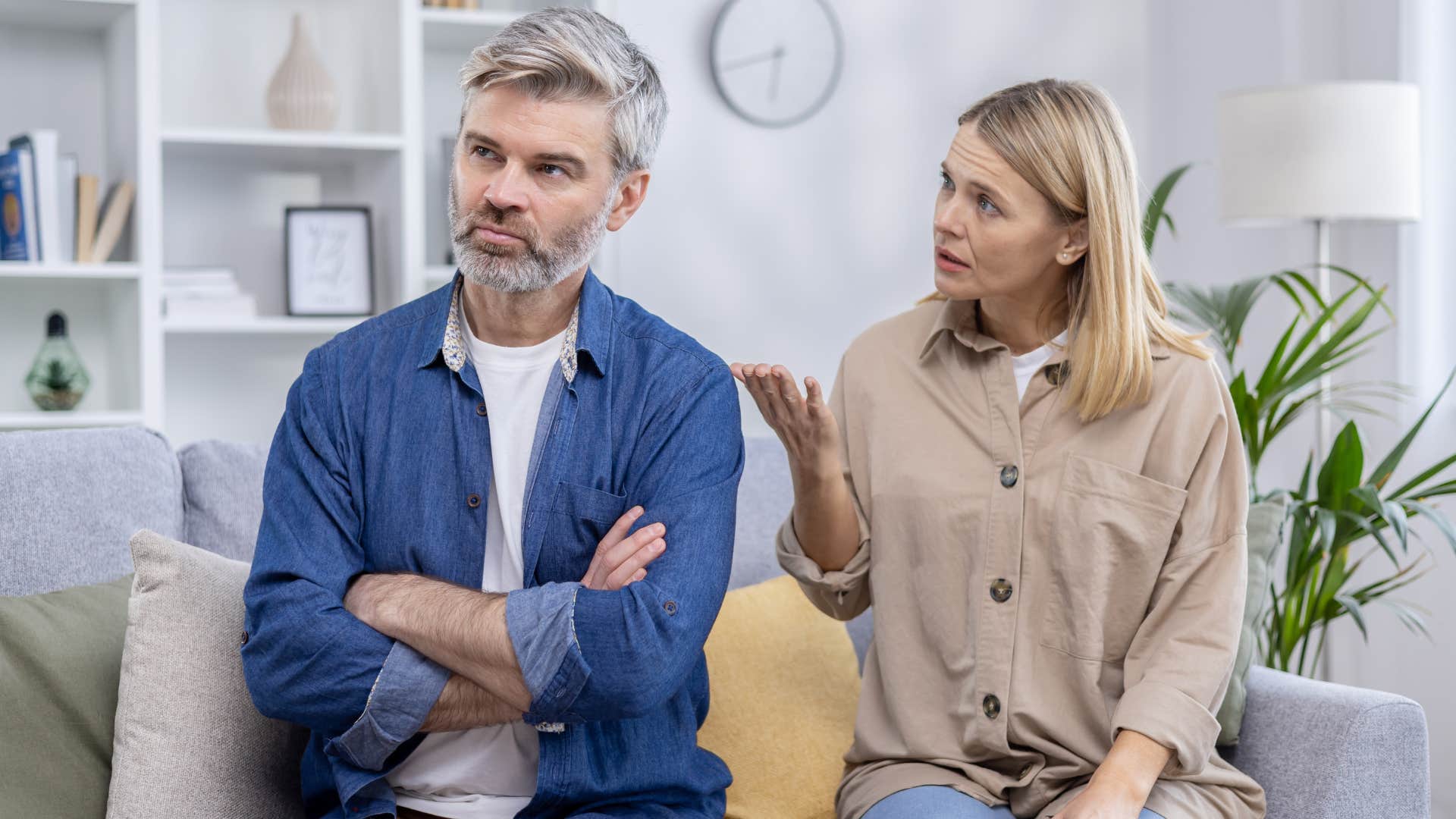 Woman arguing with her upset husband.