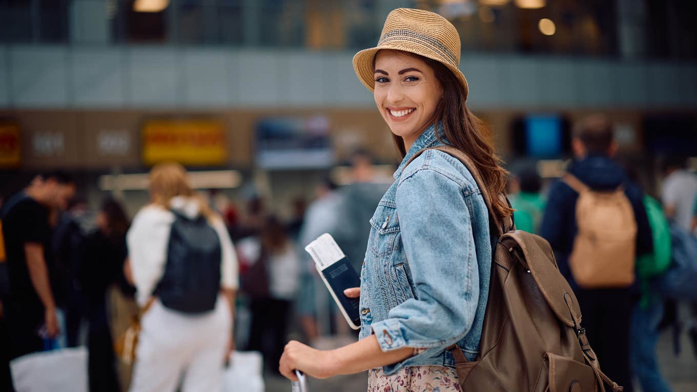 Woman excited to get on the plane