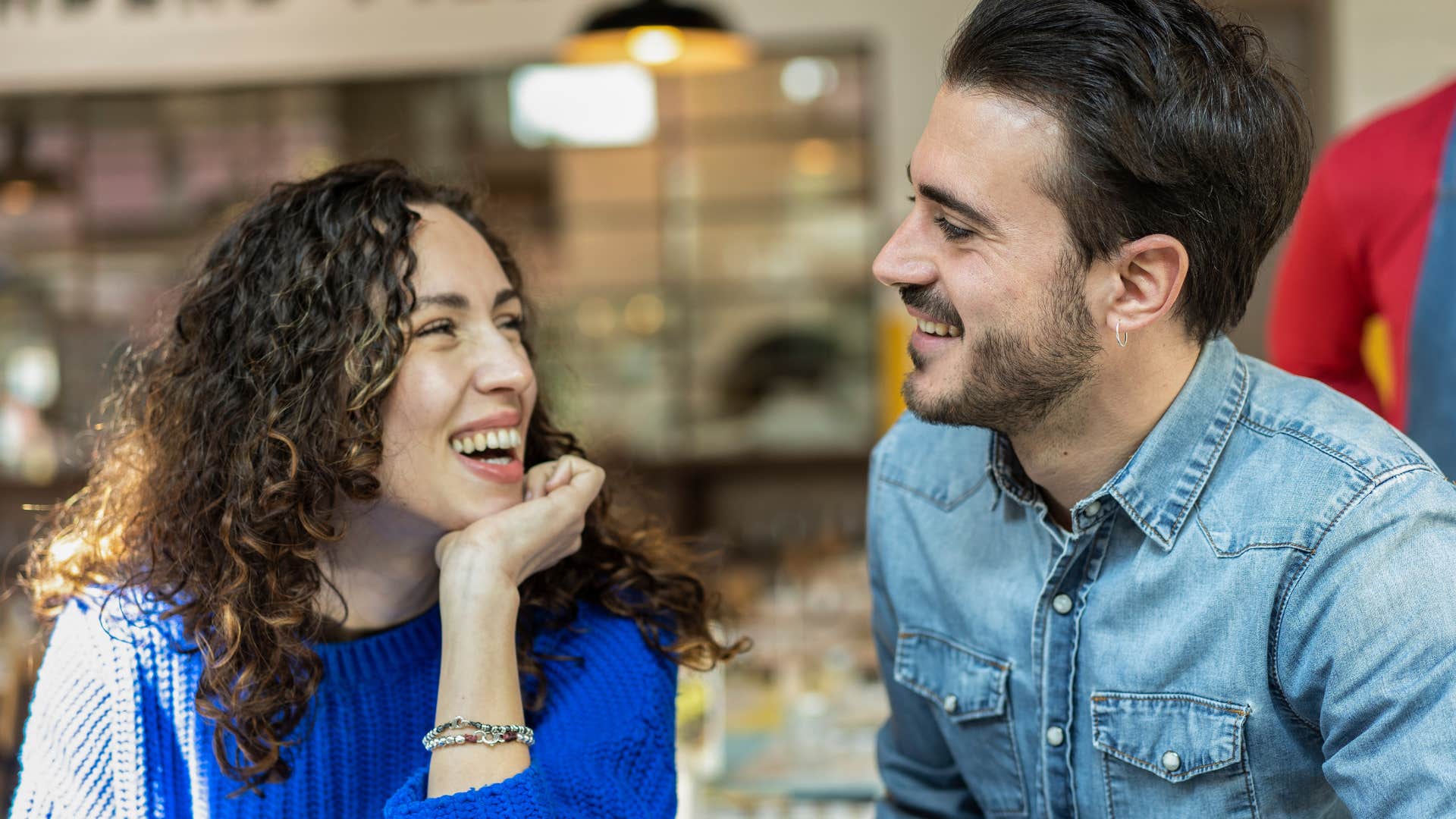 Couple smiling together on a first date