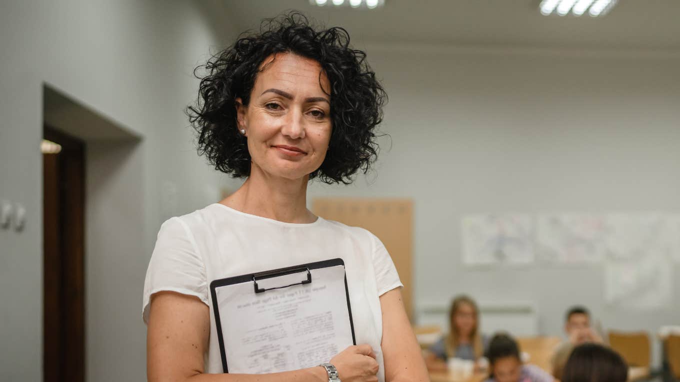 Teacher standing before a class