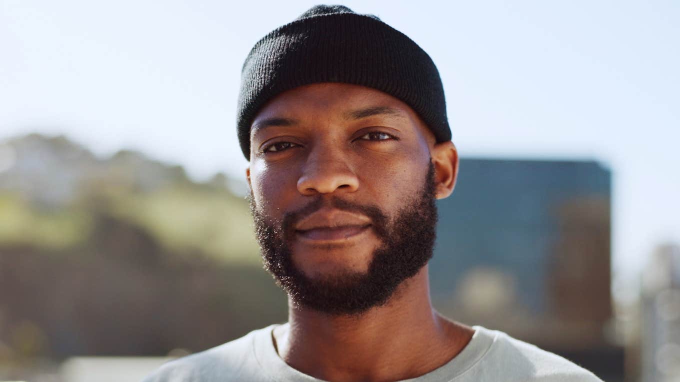 empathetic man looking straight ahead