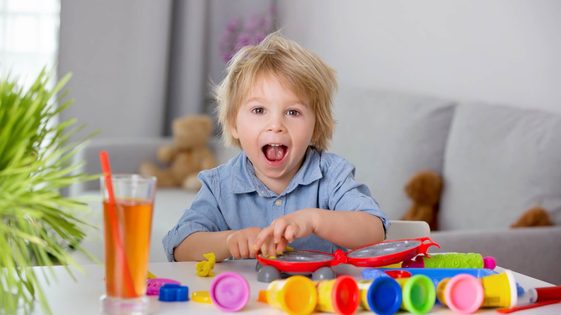 child playing with play-doh