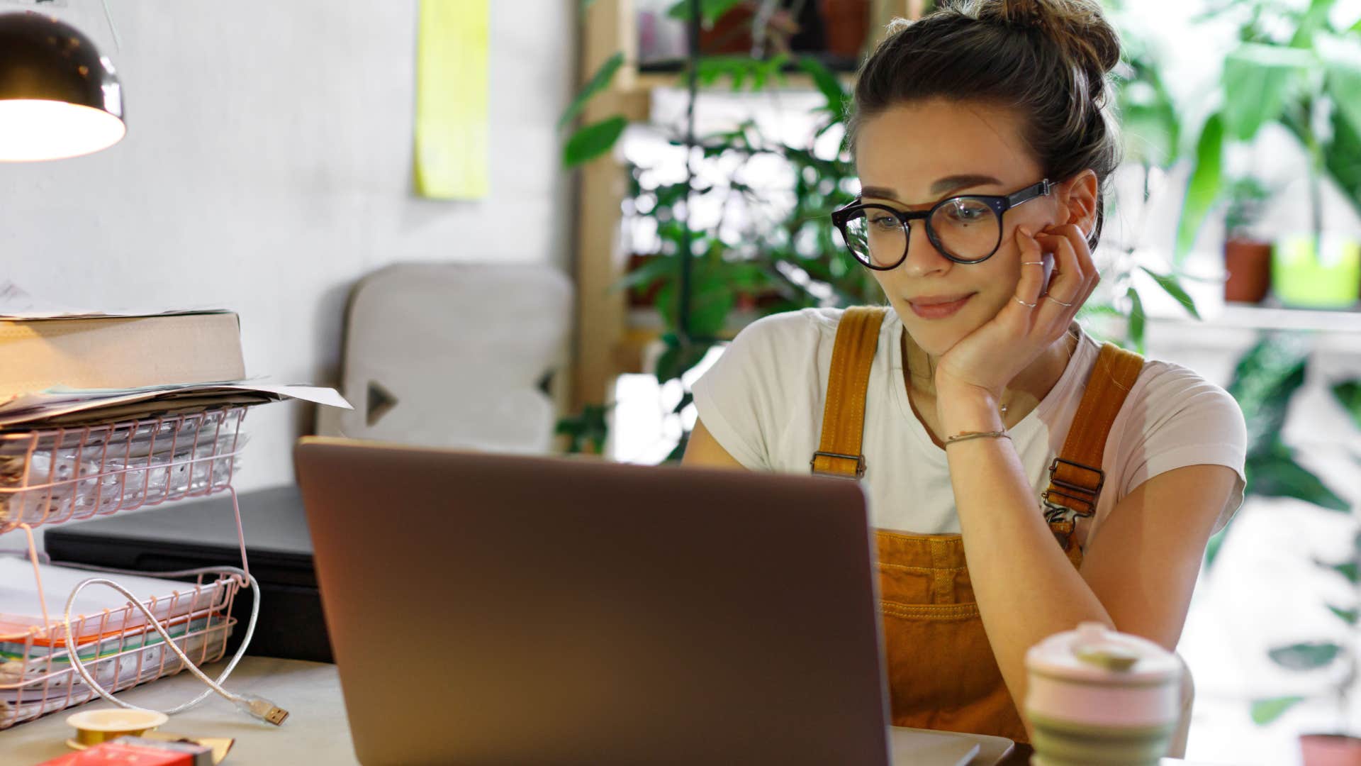 Woman looking at her laptop. 