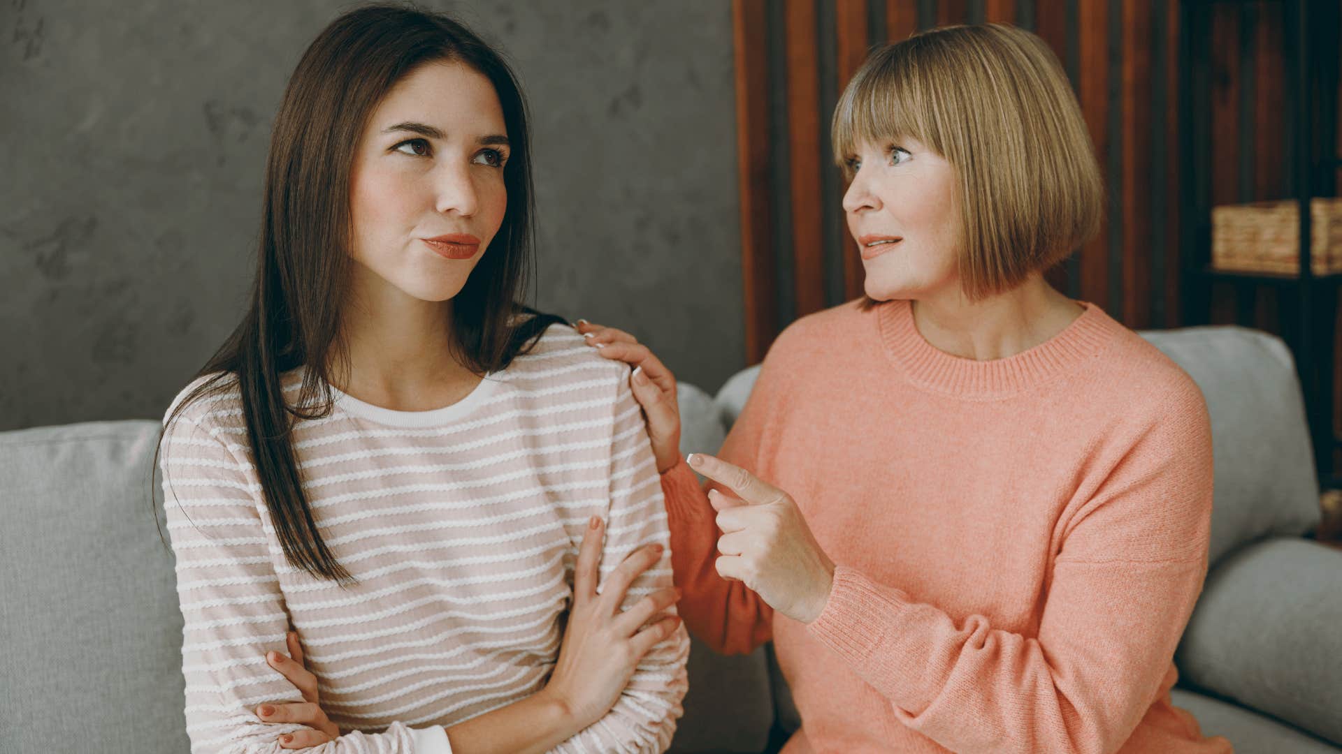 woman scolding other woman