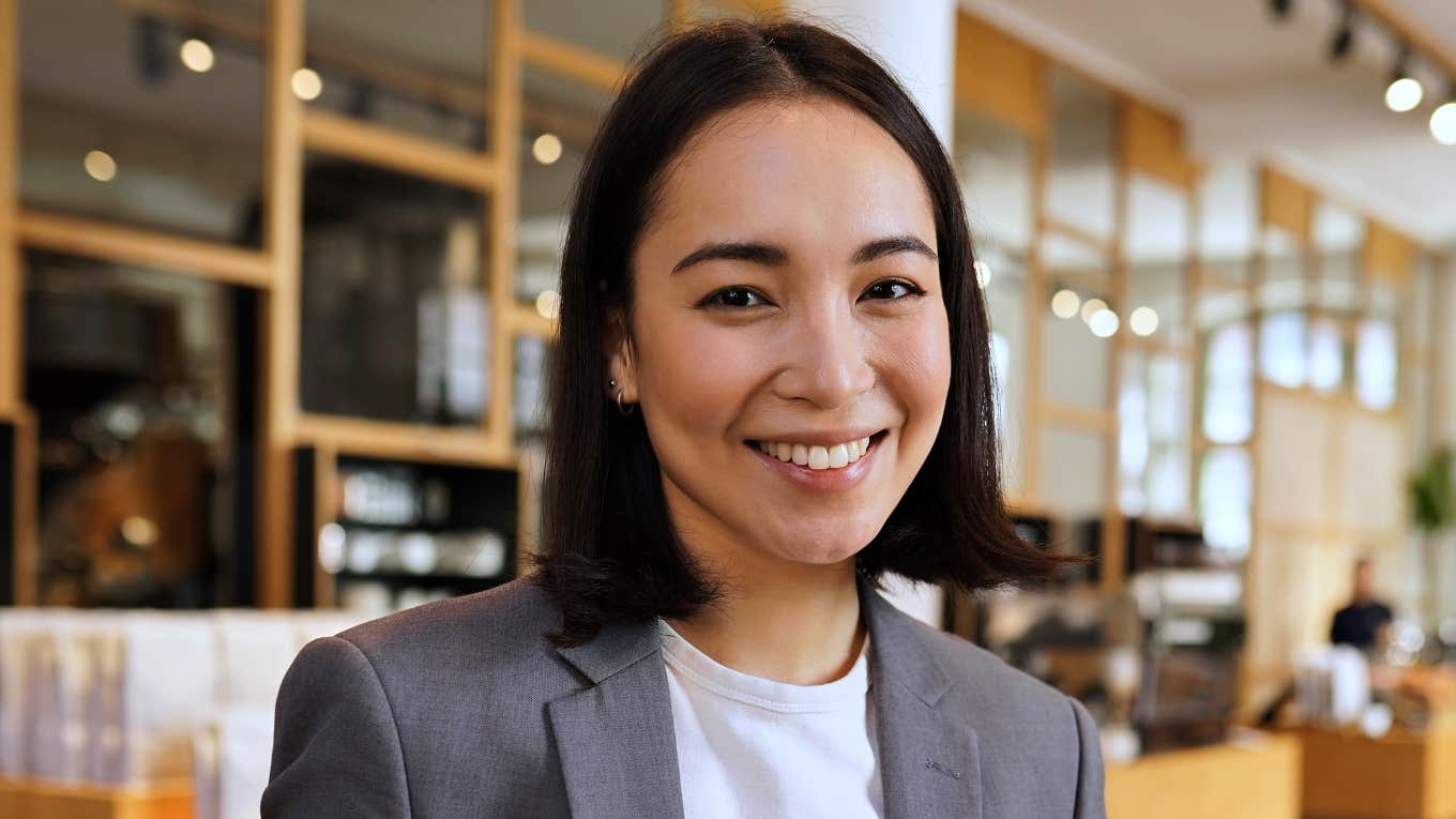 smiling young classy businesswoman