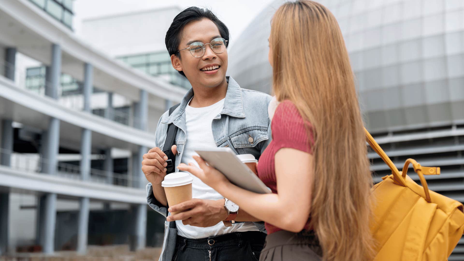 woman and man talking after classes 