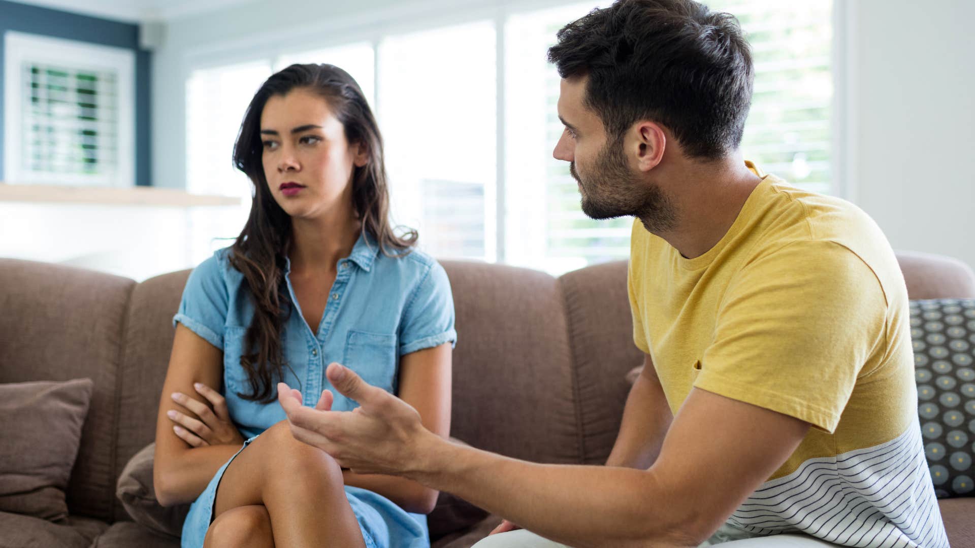 emotionally stunted man arguing with a woman