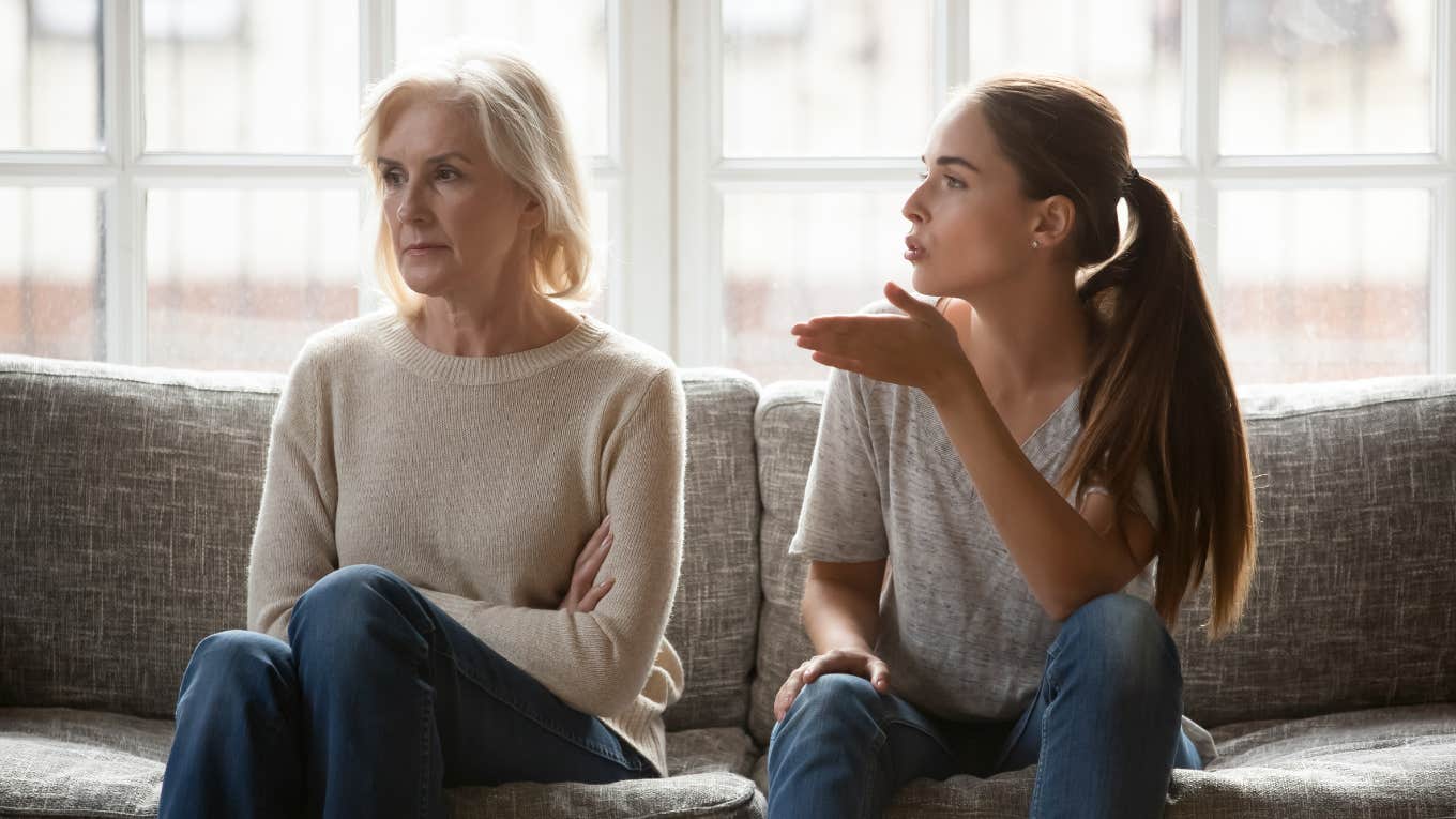 adult woman yelling at older mother