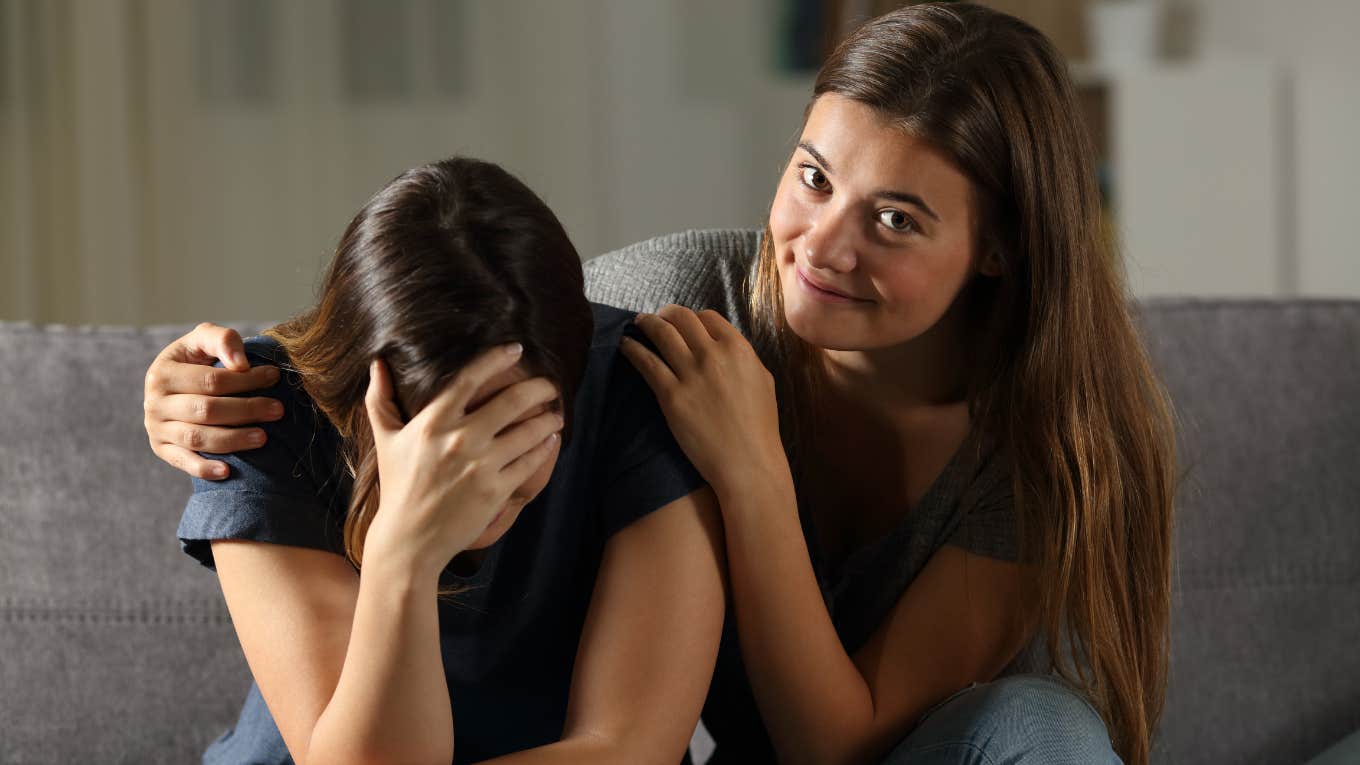 friend comforting her friends suspiciously