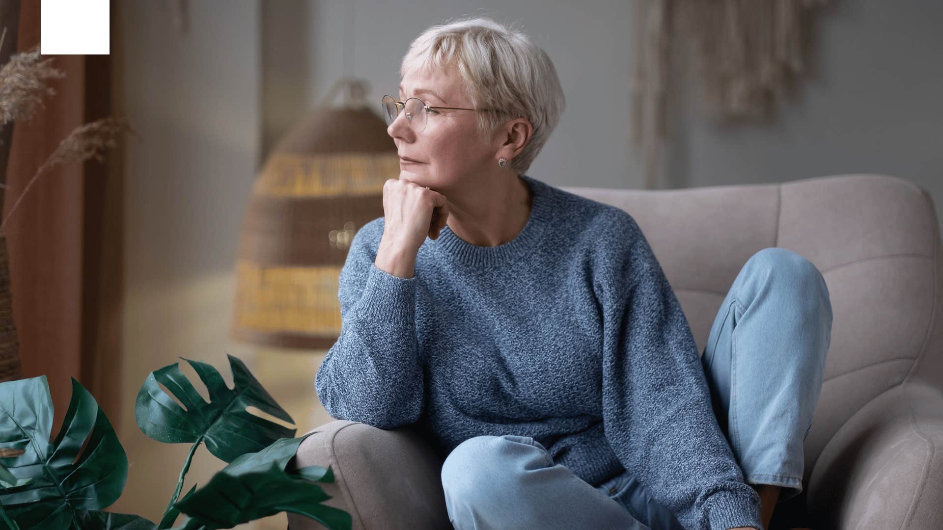 older woman sitting alone