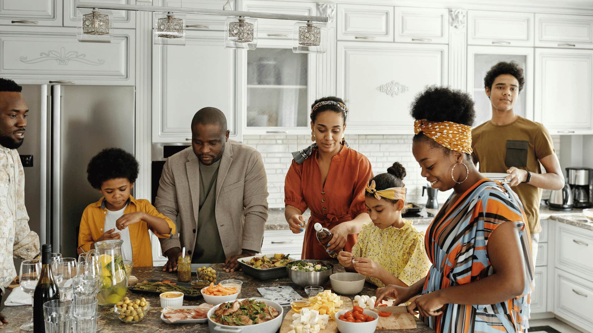 family making dinner in the kitchen