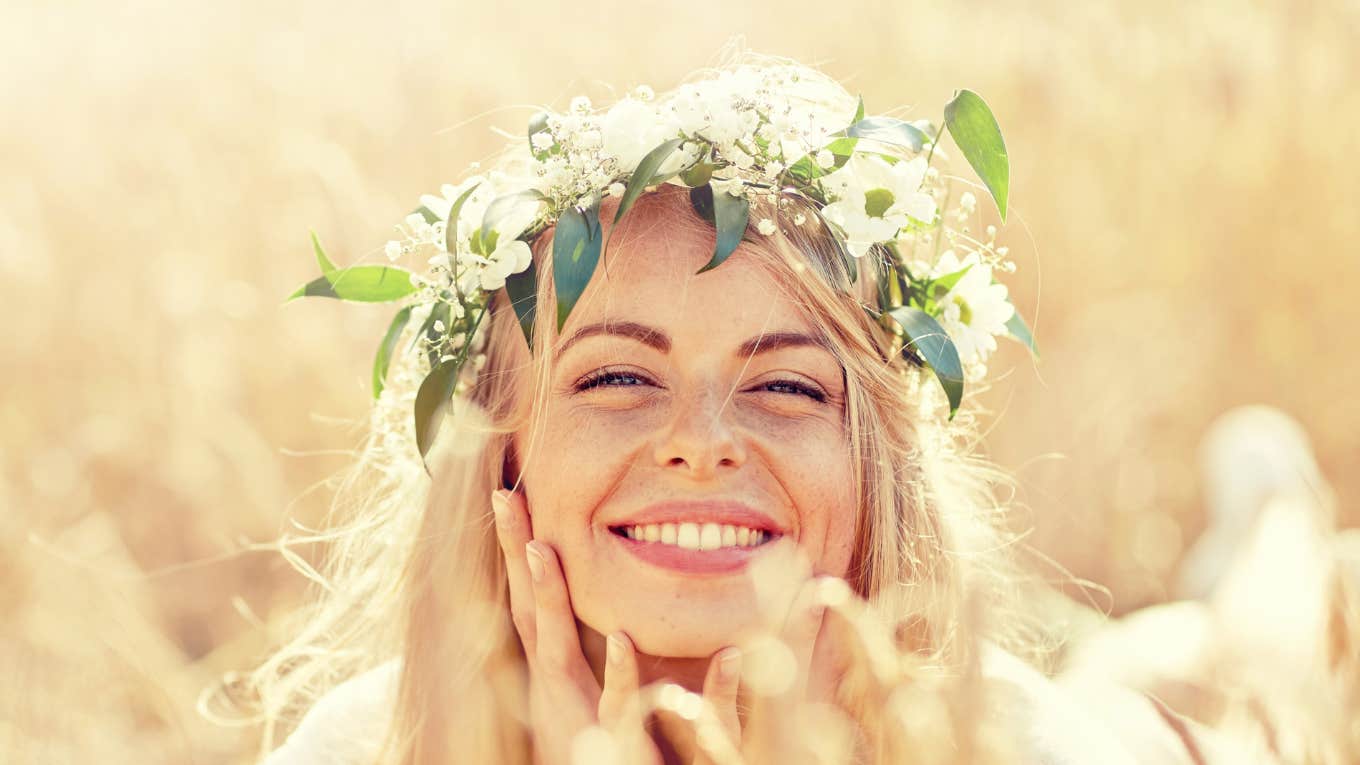 Women wearing flower crown smiling