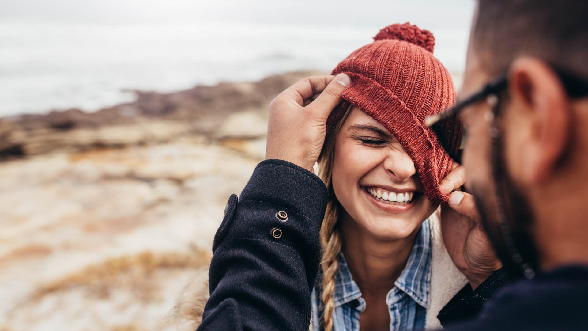 woman laughing and improving her relationship