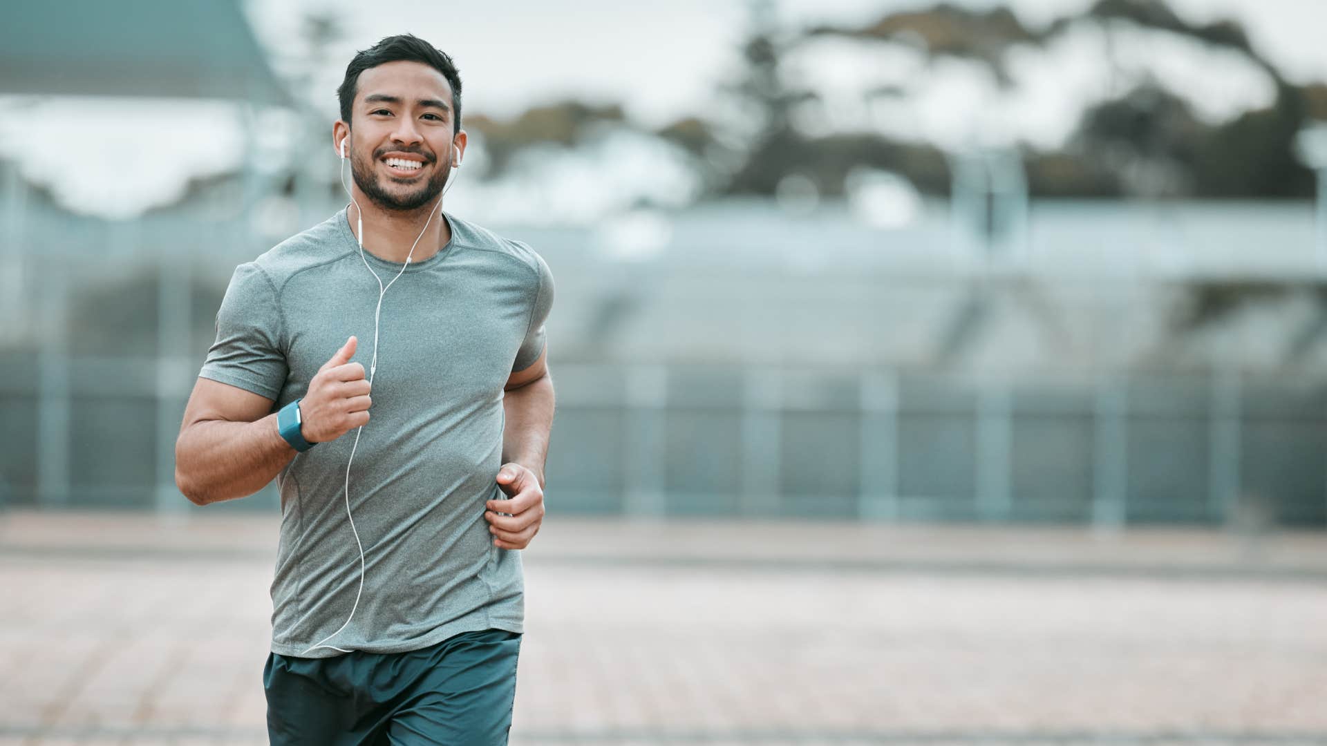 man laughing while improving his health