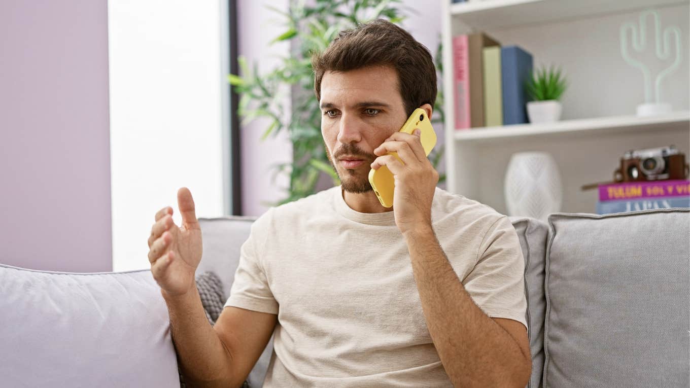 Man defending his wife during a phone call with his father-in-law