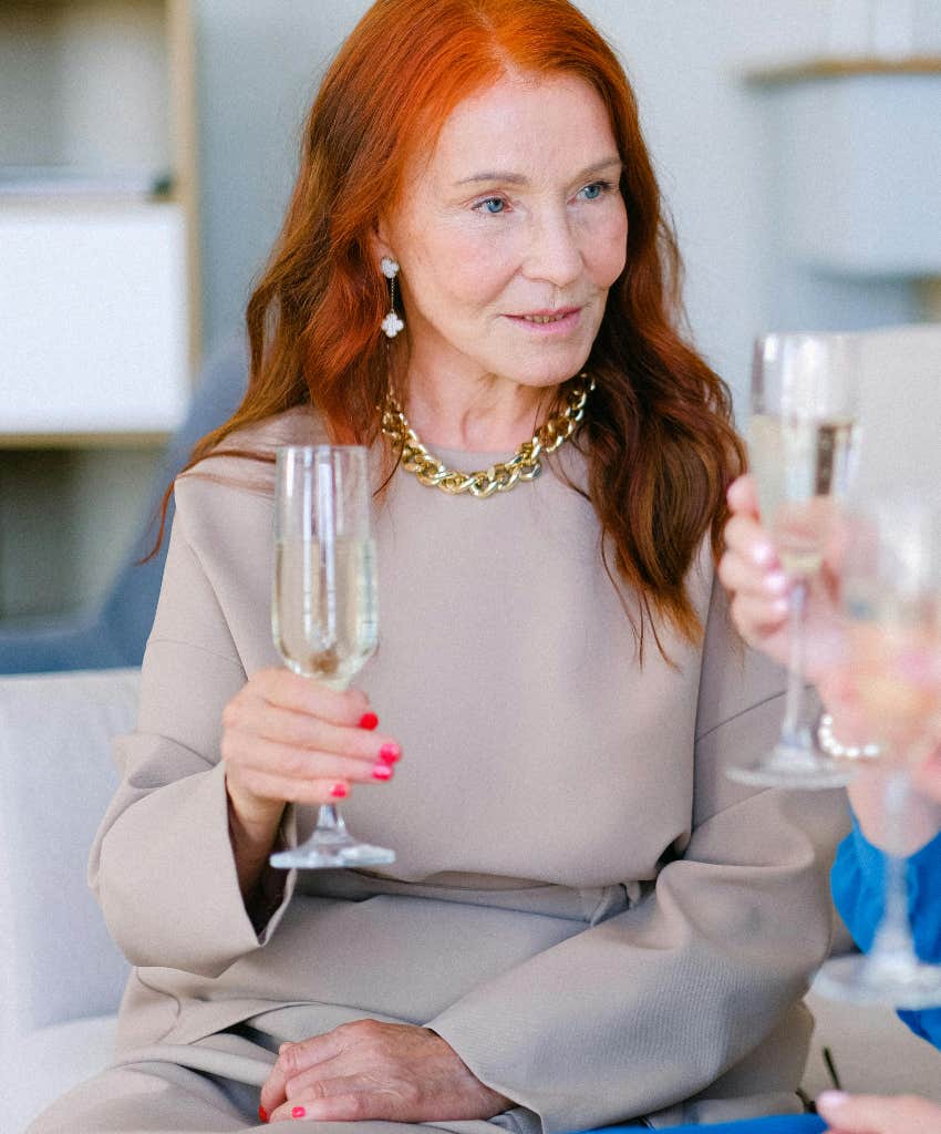 Woman drinking at wild wedding