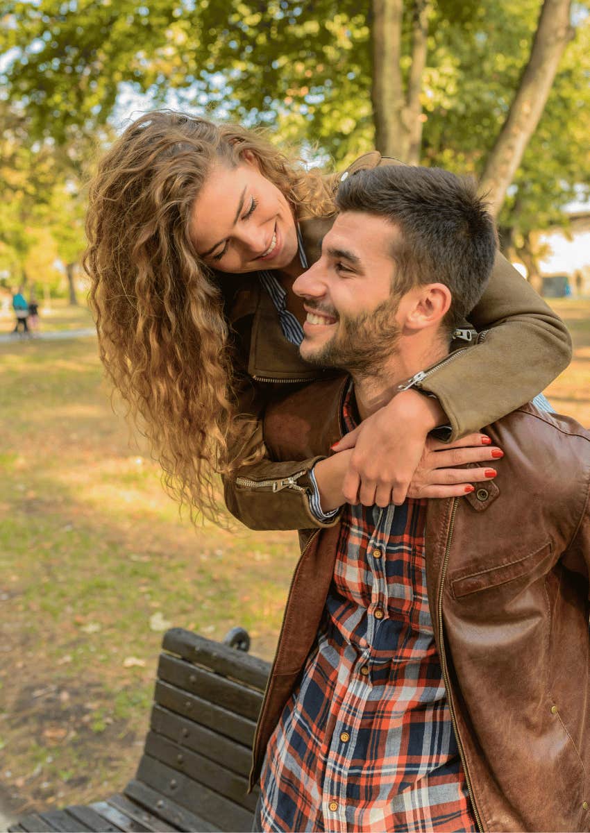 woman hugging a man from behind