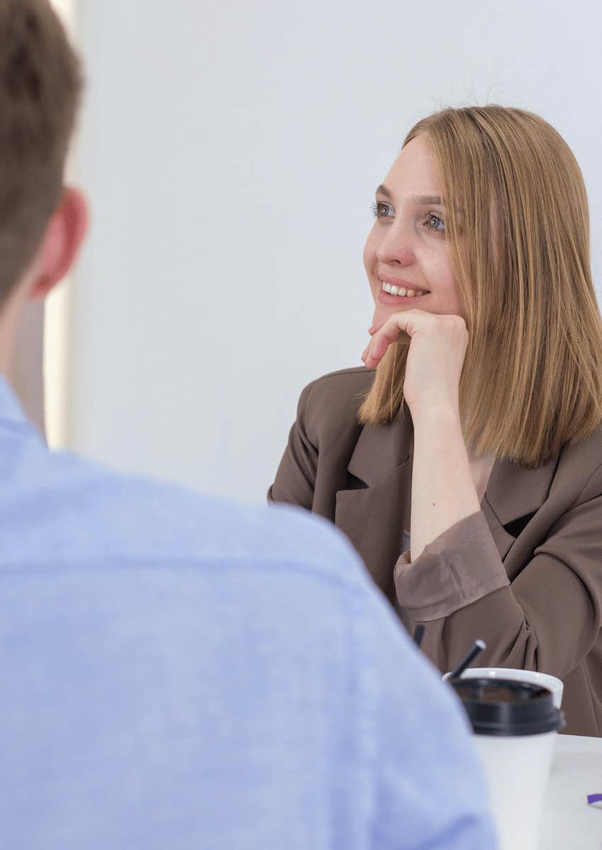 woman smiling and networking