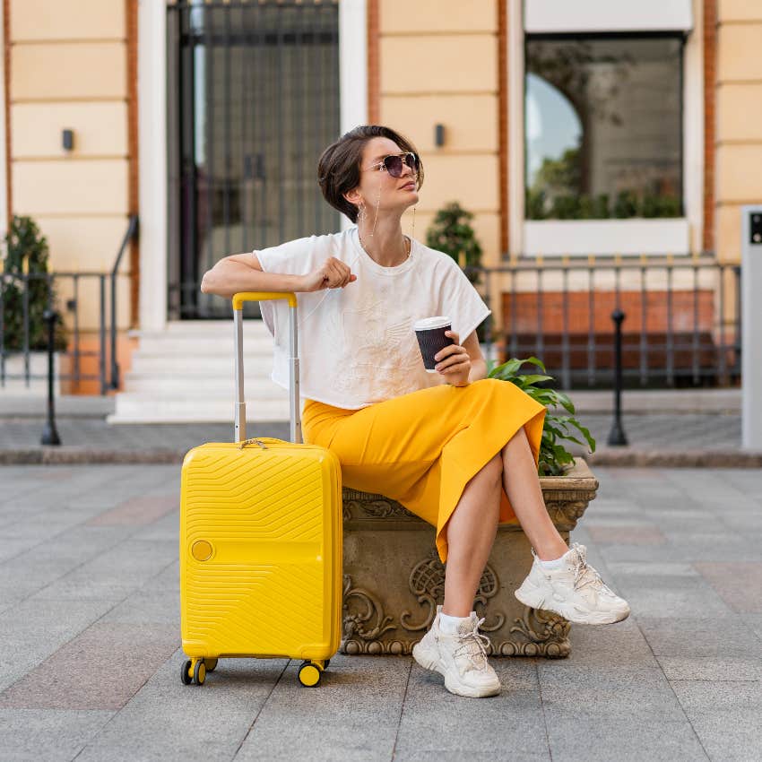 Woman waiting to check in to her Airbnb