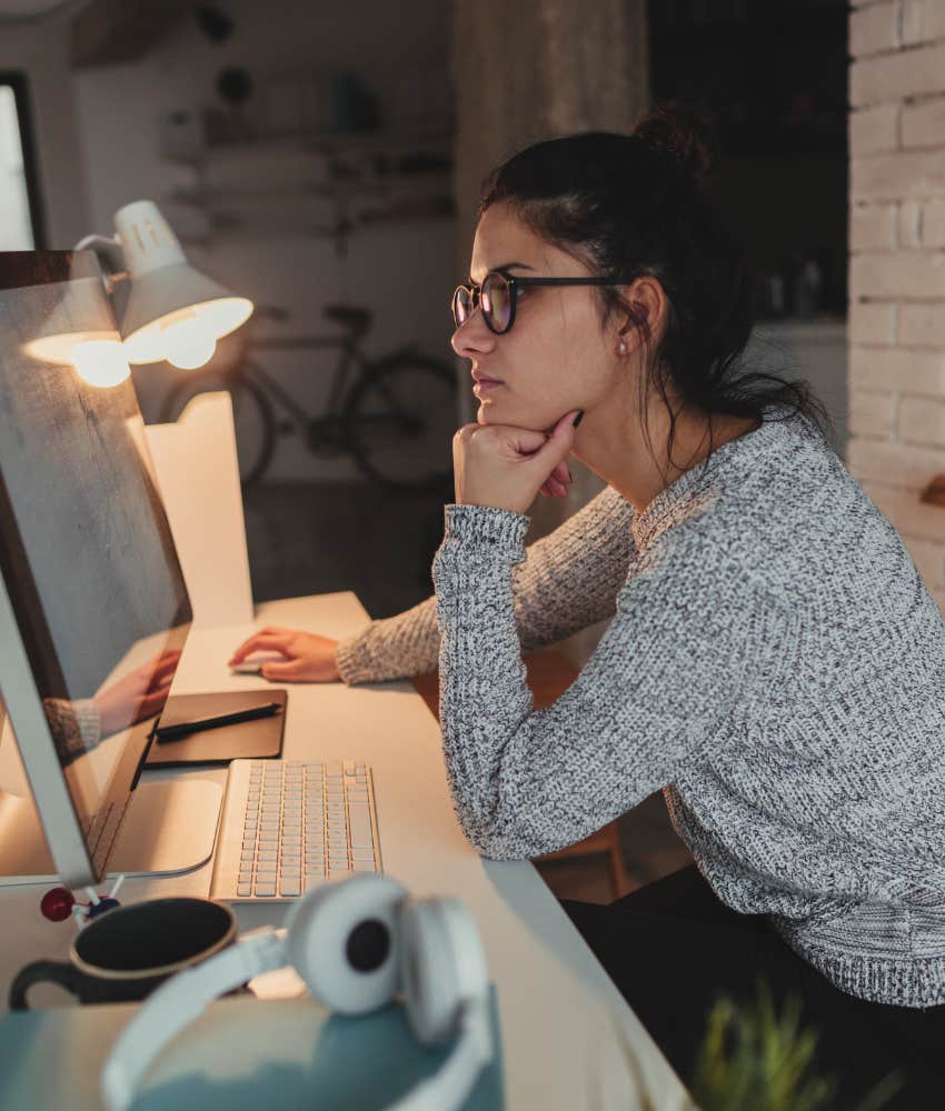 woman working late at her desk