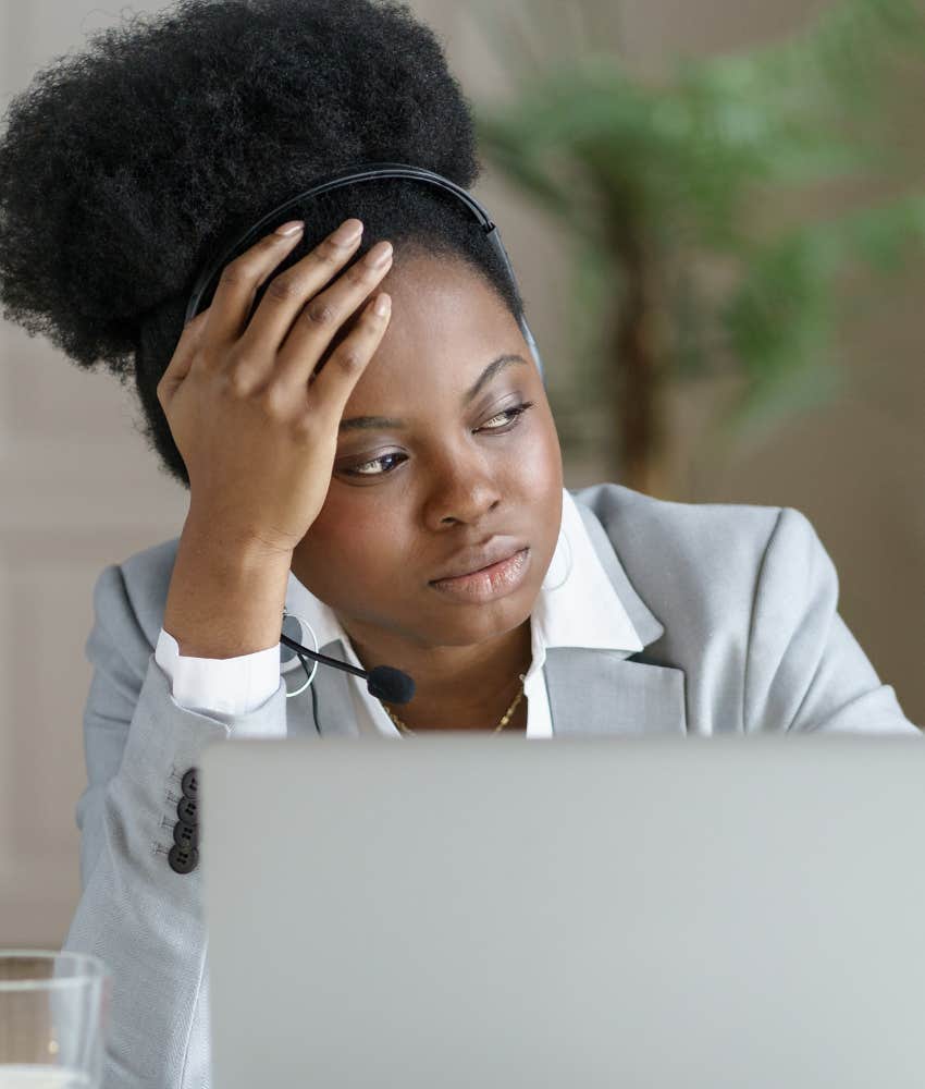 frustrated worker holding her head falling down career ladder workplace prediction