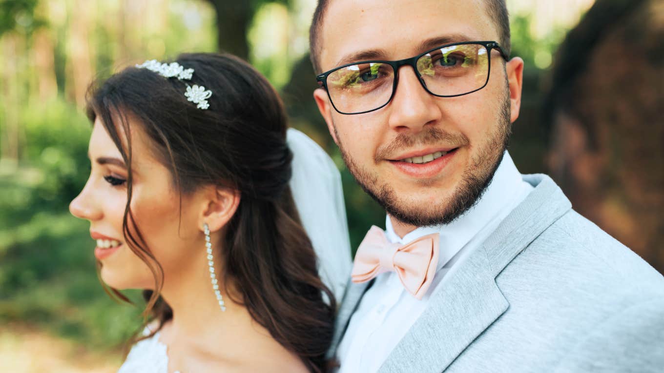 Man on his wedding day making his vows to his wife. 