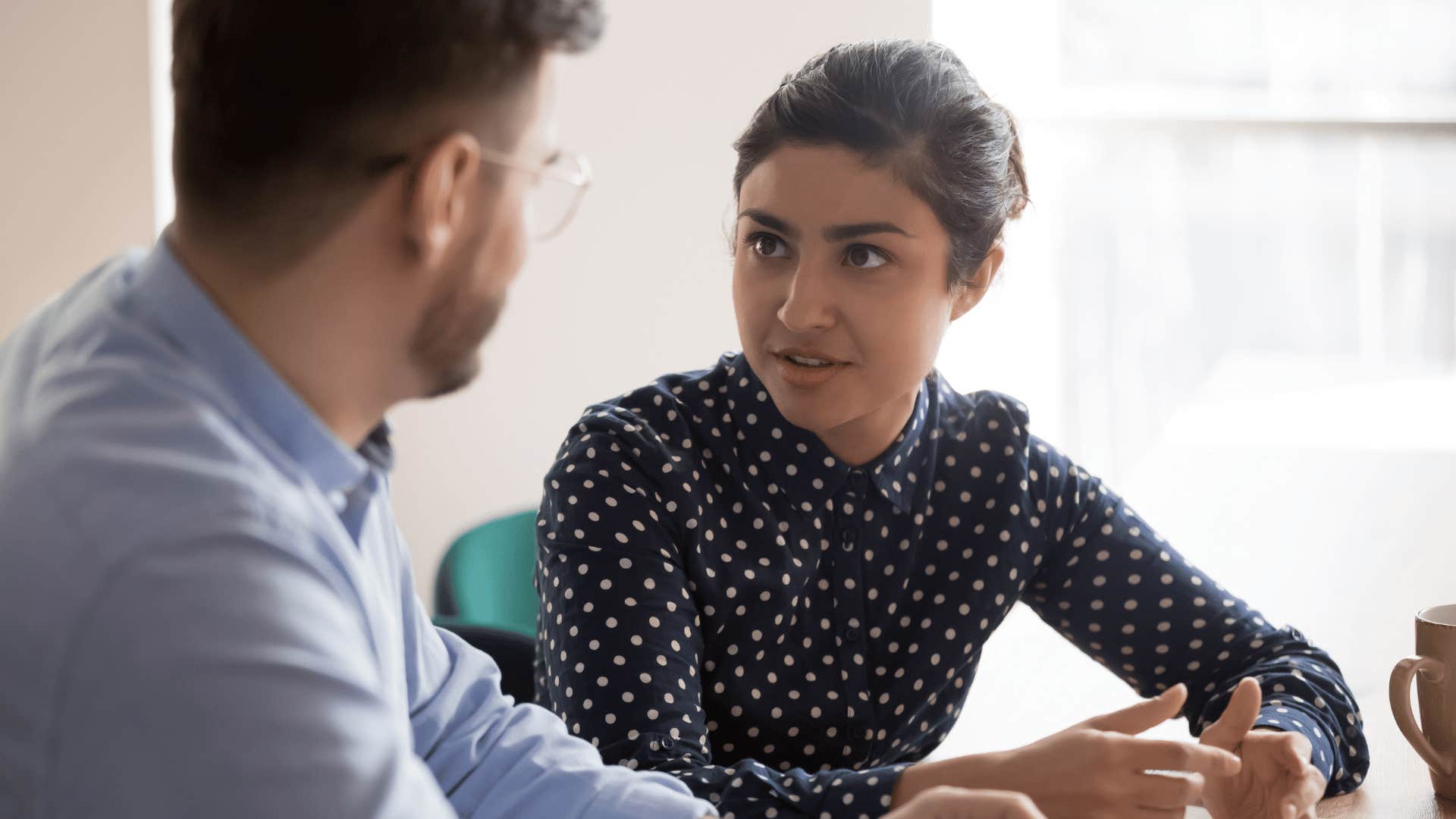 woman talking to coworker