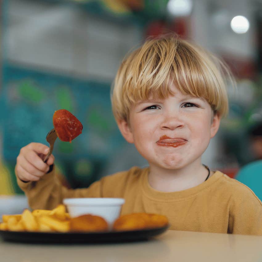 young boy in a restaurant