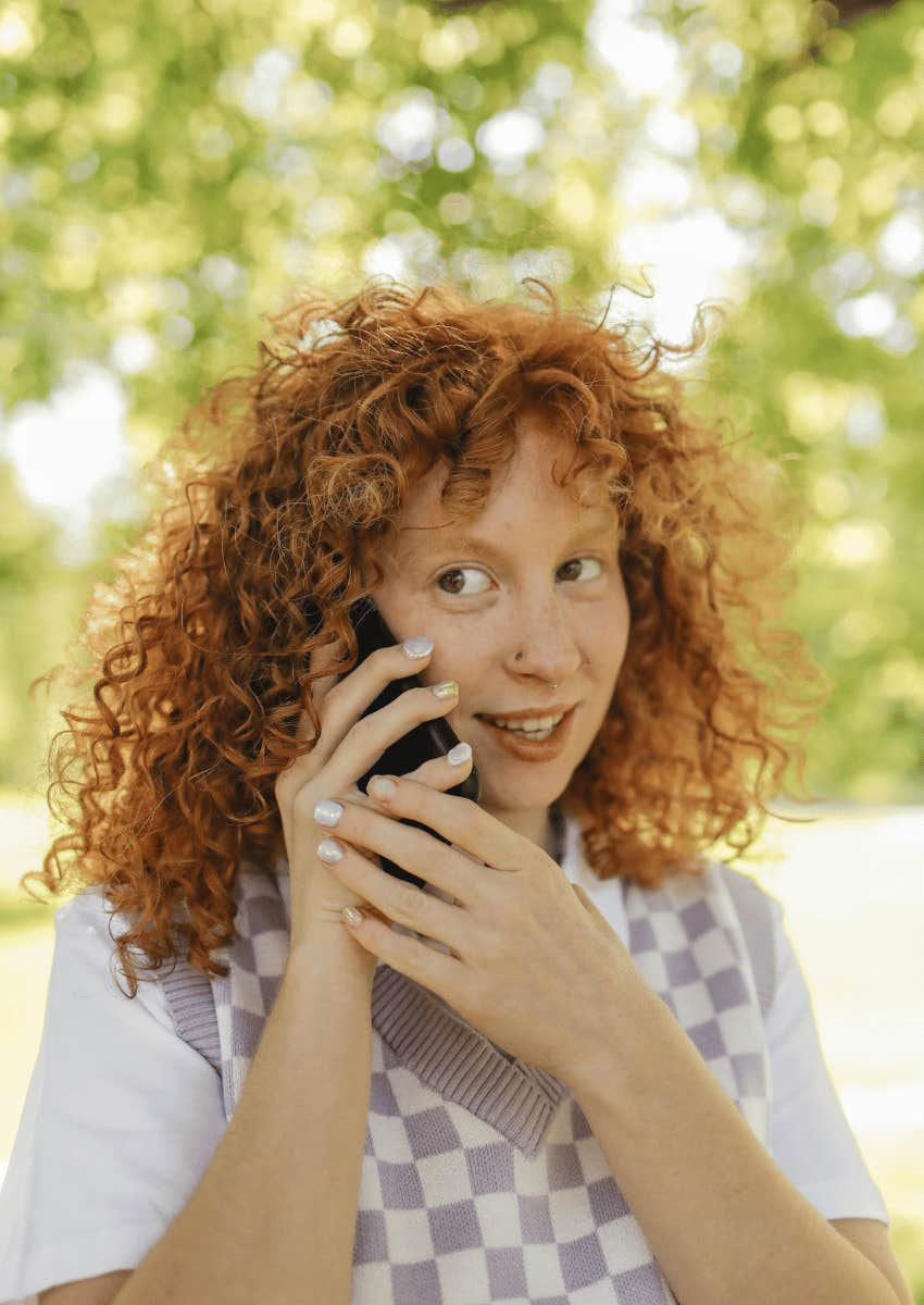 young woman speaking on a phone