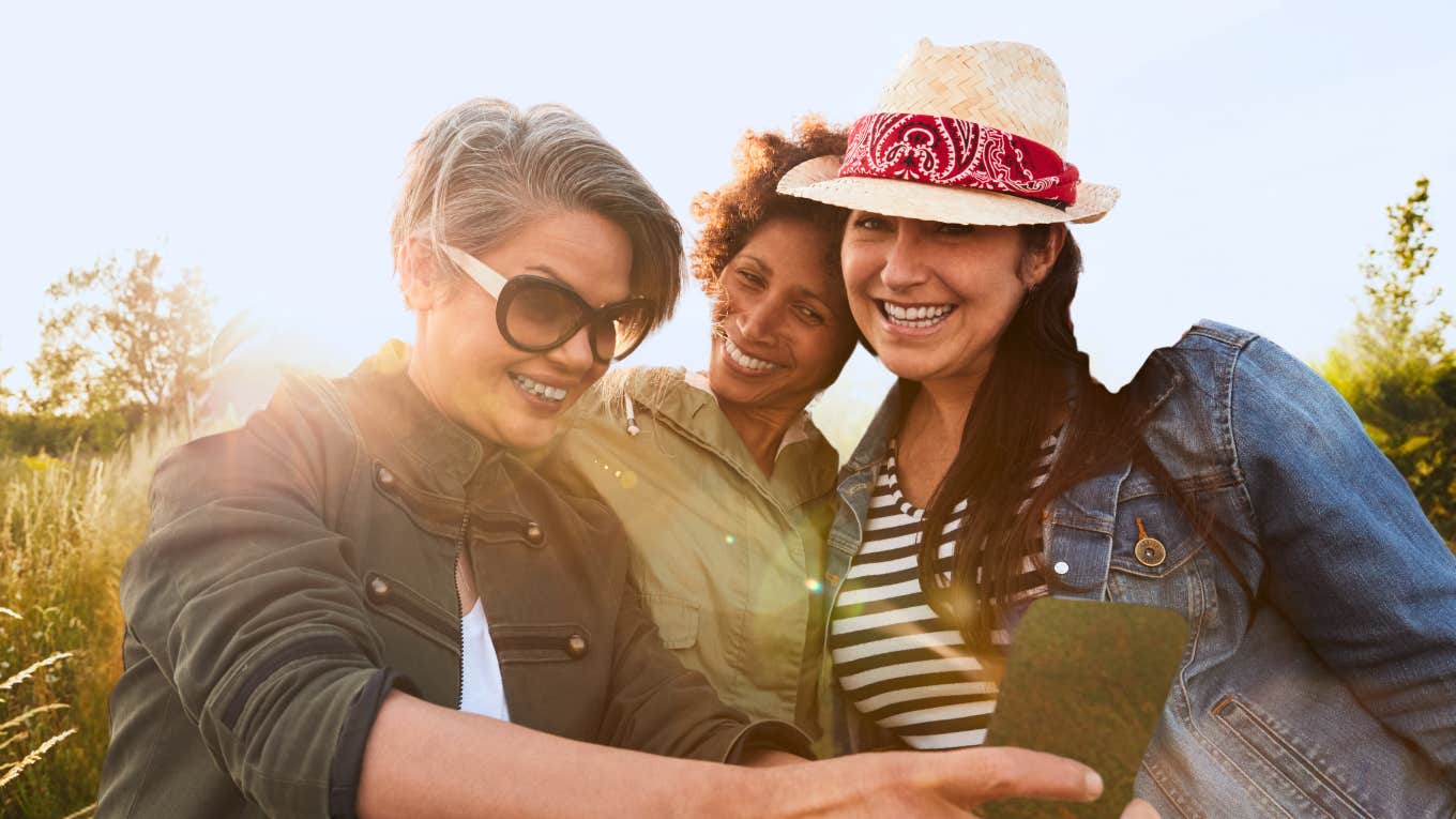 Three women in their 40s and 50s making joyful decisions about life