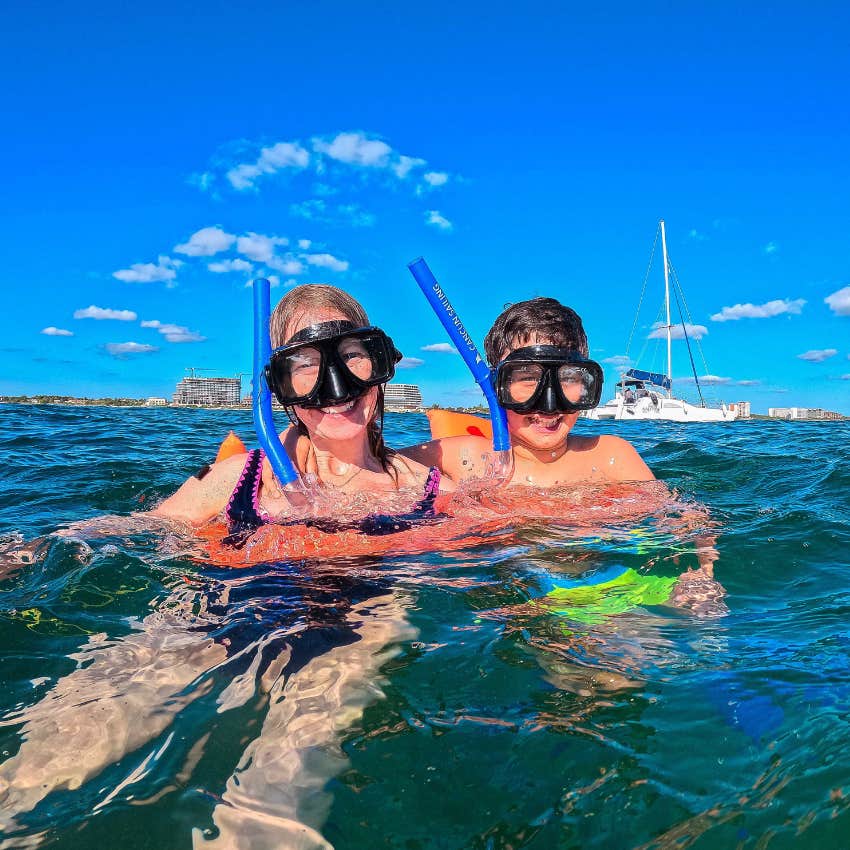 Mom and son snorkeling learning holiday lessons 